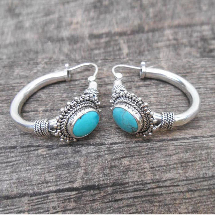 Elegant Sterling Silver Earrings Adorned with Turquoise