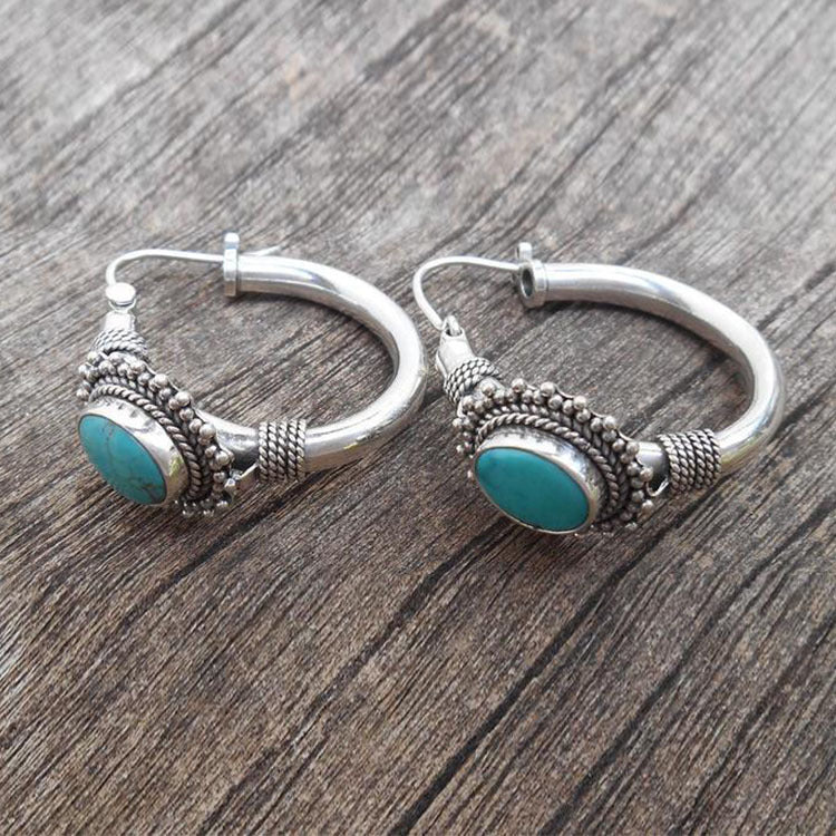 Elegant Sterling Silver Earrings Adorned with Turquoise