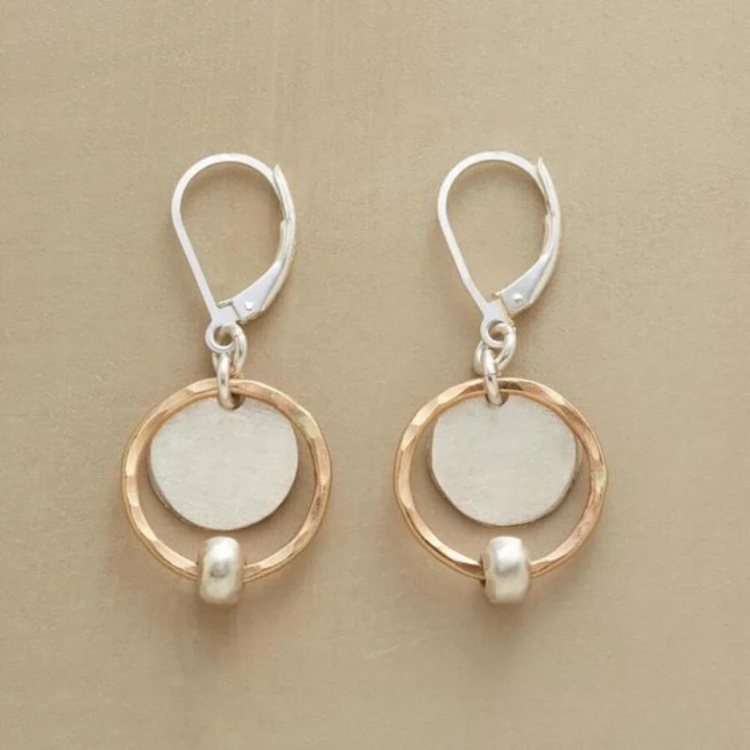 Elegant Gold and Silver Earrings Adorned with Pearls