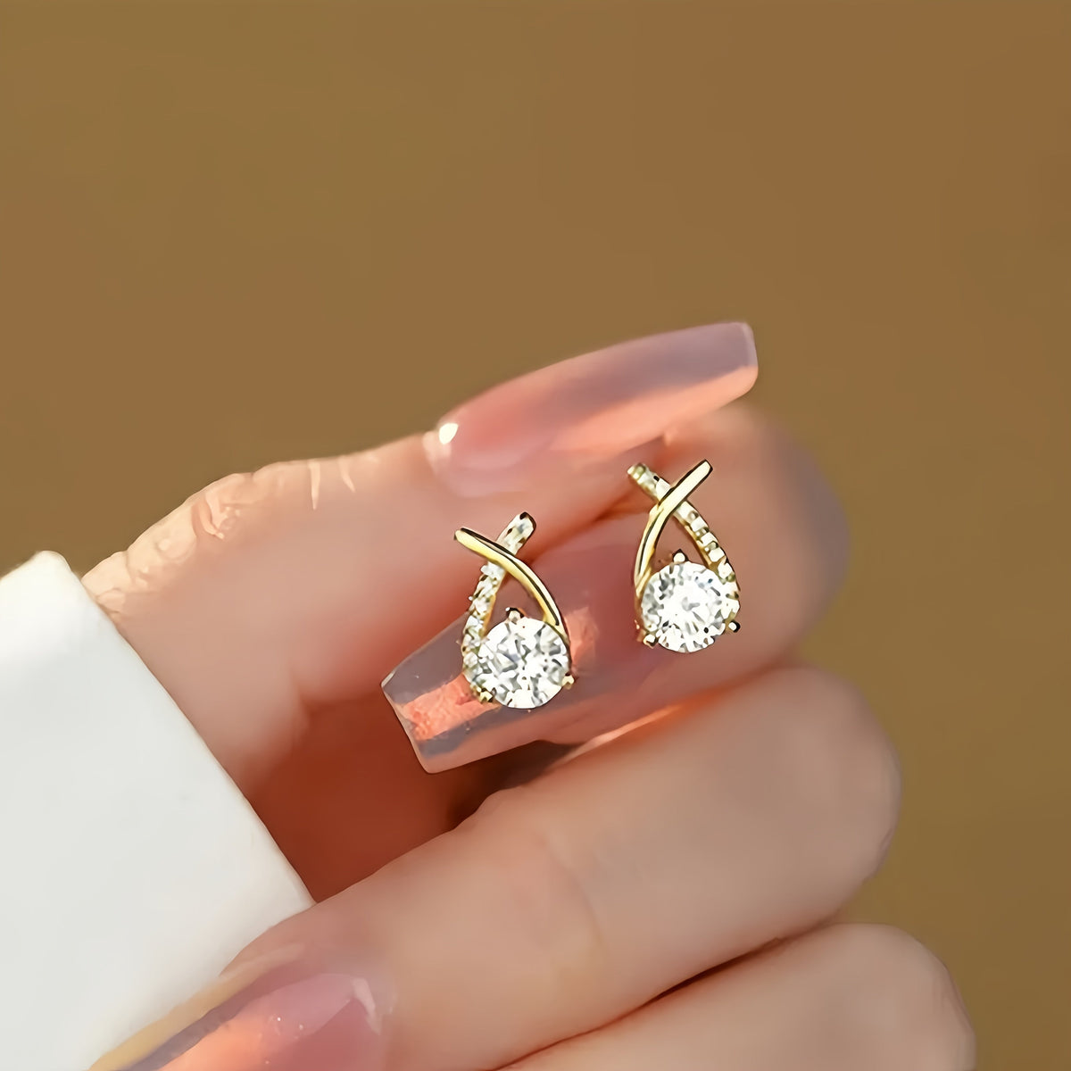 Leija — Zirconia Curved Cross Earrings
