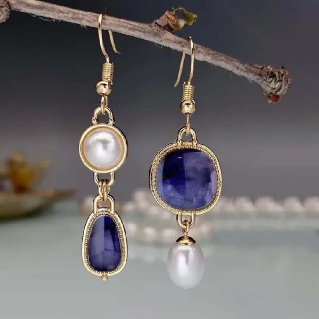 Elegant Earrings Adorned with a Blue Stone and a Pearl
