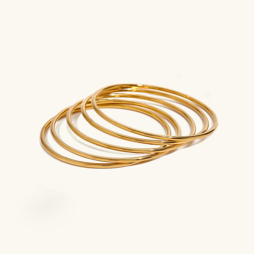 Nora — Dazzling Stackable Gold Bangle Set