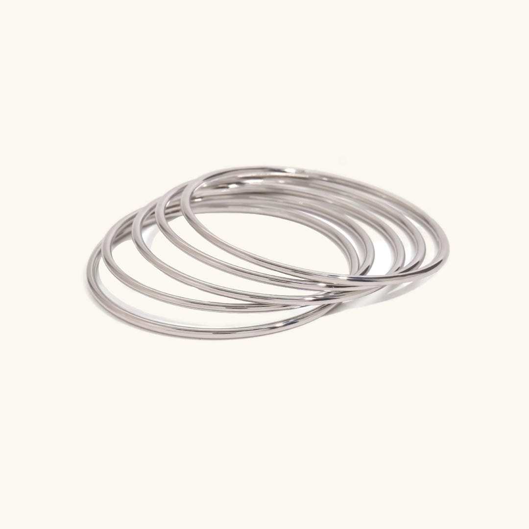 Nora — Dazzling Stackable Gold Bangle Set