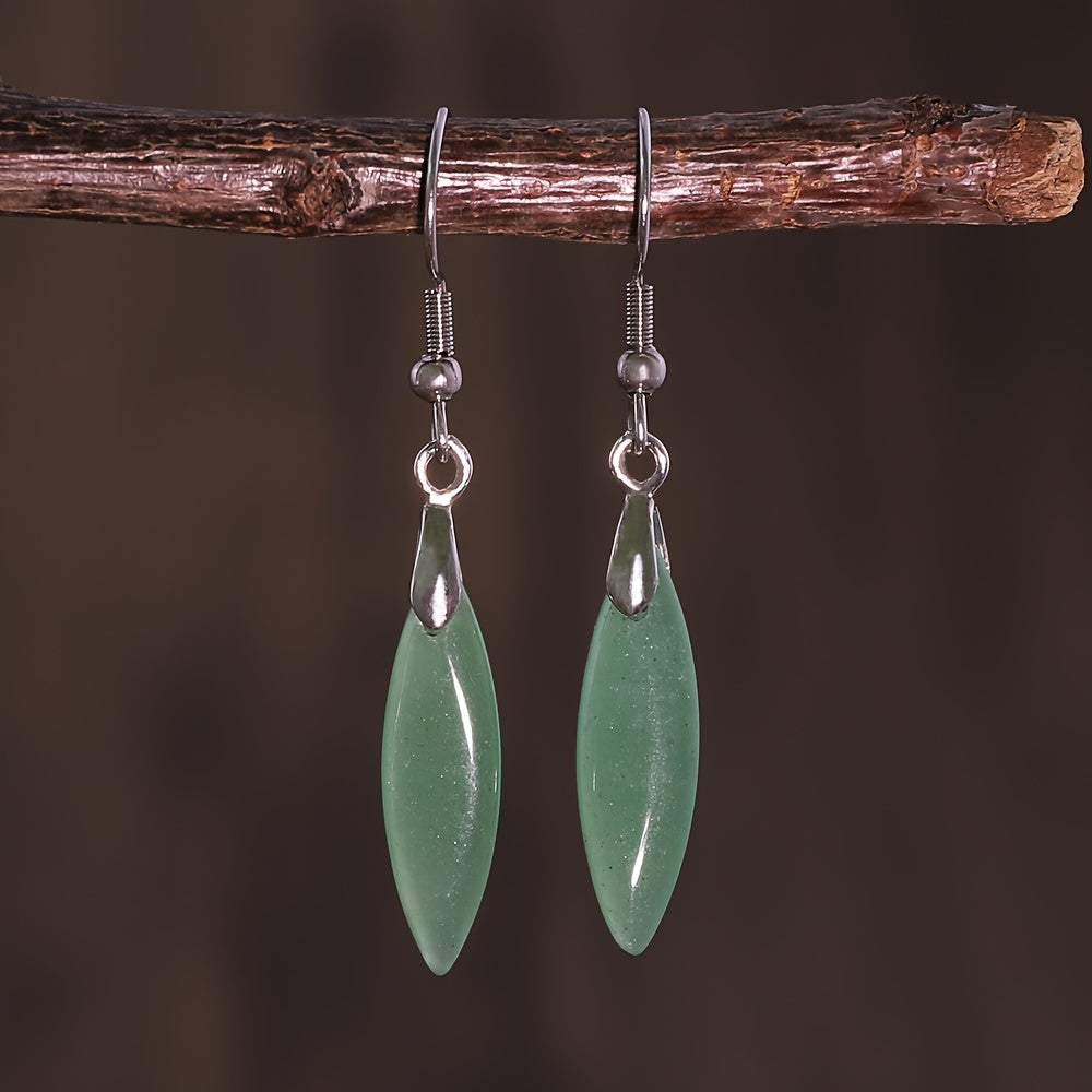 Slim green marquise drop earrings hanging from silver-tone hooks with bead details.