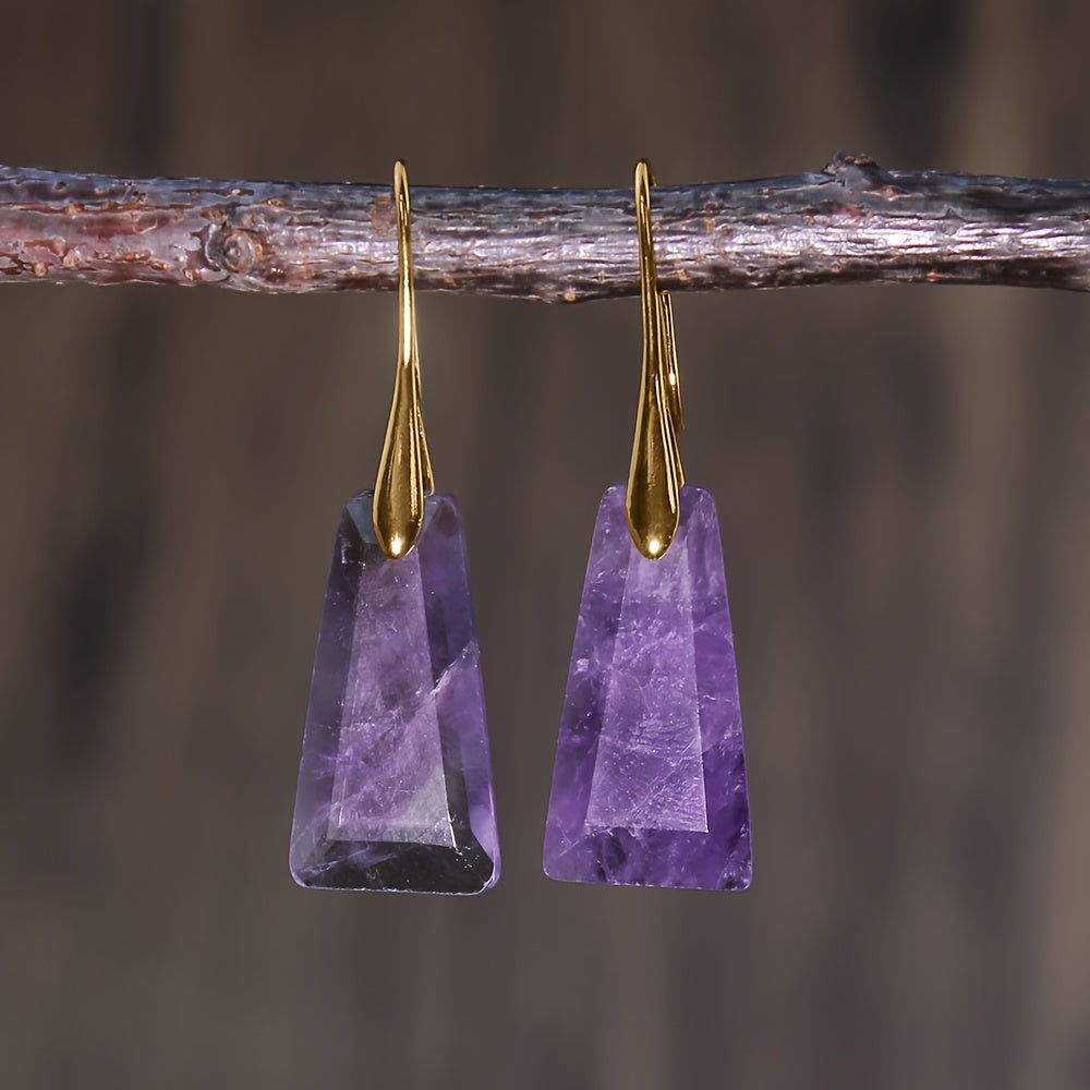 Purple tapered geometric earrings with tonal patterning and long gold-tone hooks.