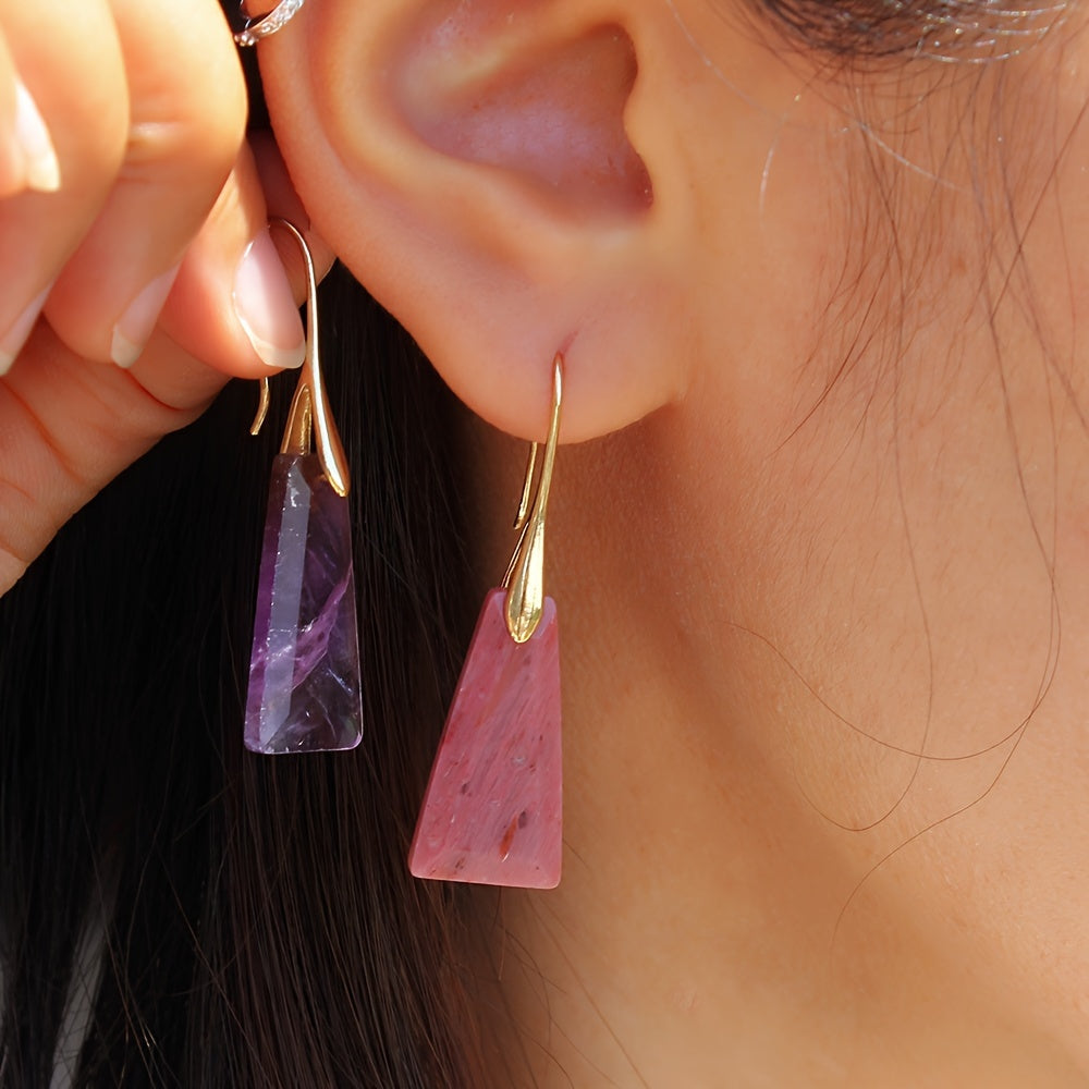 Pink and purple geometric earring color options shown beside the face; each color is a separate option.
