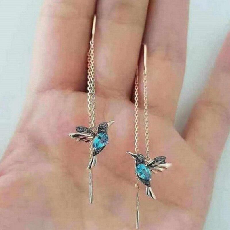 Vera hummingbird chain drop earrings with blue center accents