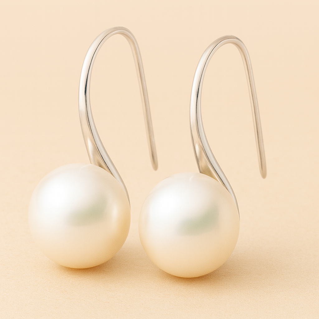 Elegant teardrop drop earrings adorned with pearls