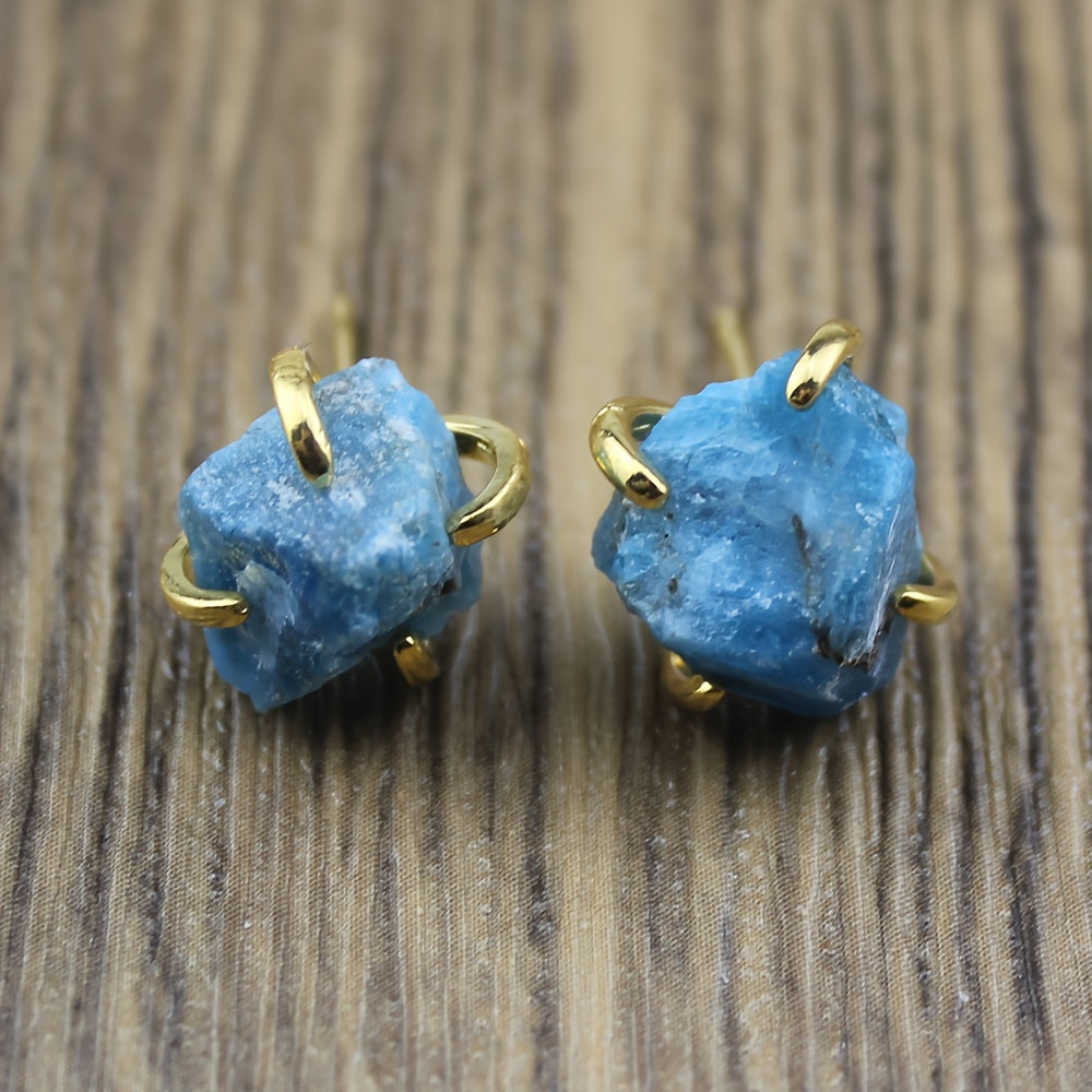 Blue irregular textured stud earrings held by gold-tone claw settings.