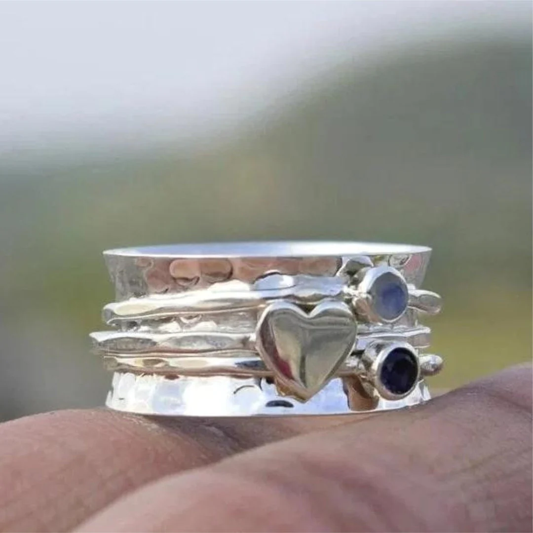 Elegant Spinning Silver Ring with Heart