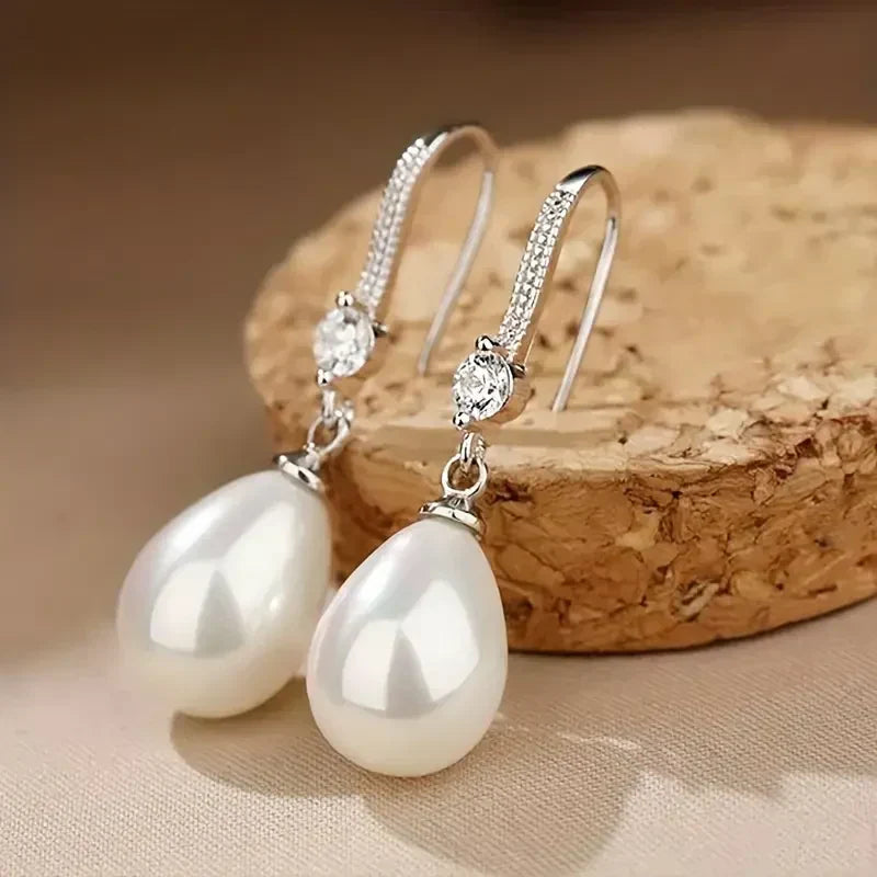 Aurora — Dangling Earrings with Bright Pearls