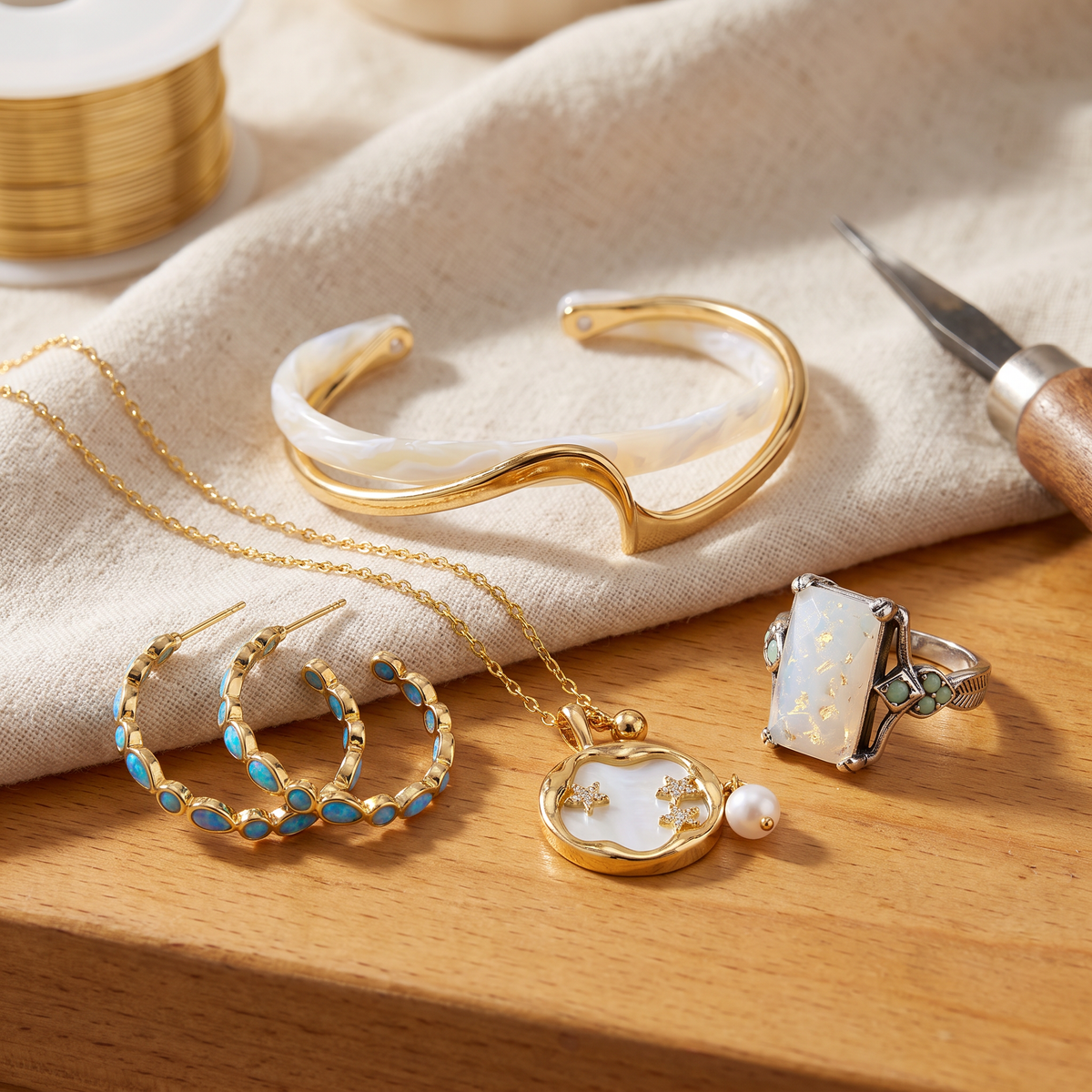 Odilia — Blue Opal Light 4-Piece Set: earrings, necklace, ring and bracelet