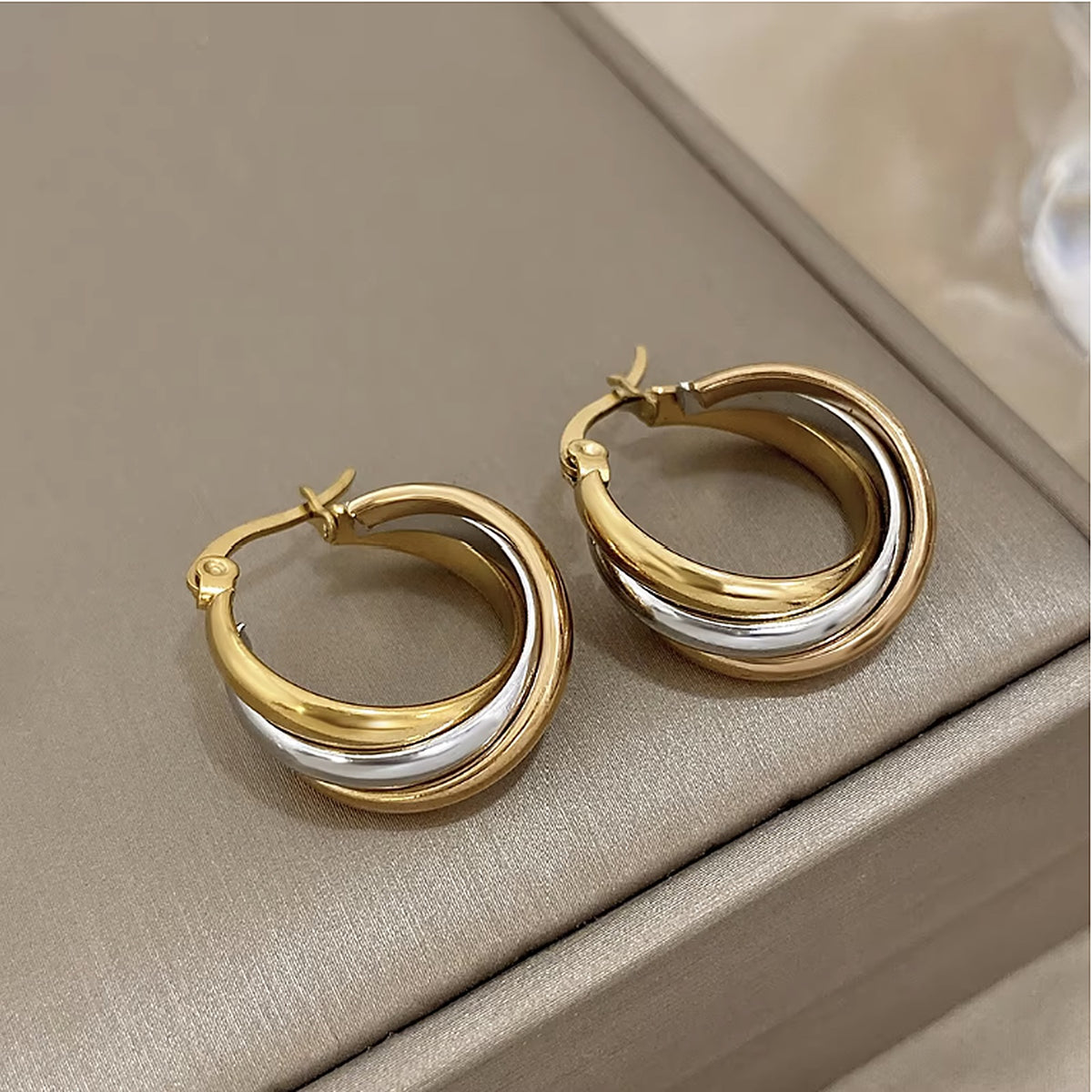 Tri-tone triple hoop earrings